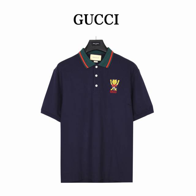Gucci Gucci Cartoon Tiger Embroidered Polo ShirtChile-based cartoonist and illus