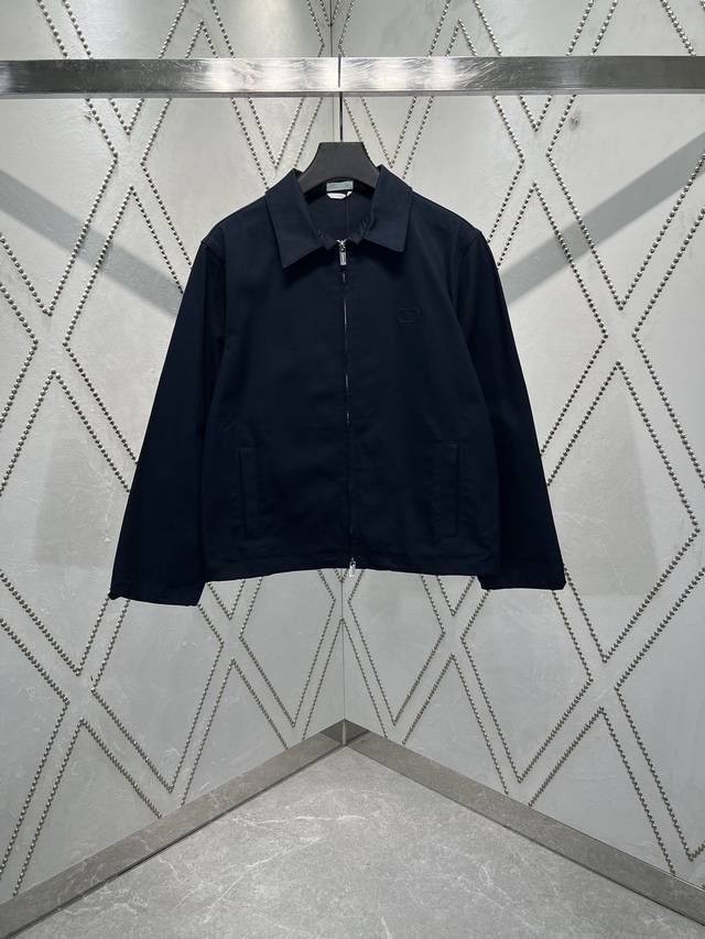 25Ss New bomber jacket crafted from navy cotton twill in a classic silhouette wi