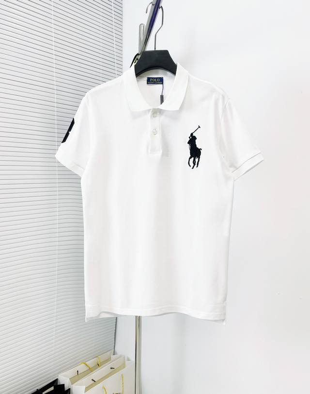 Ralph Lauren's solid color classic Polo shirt is a timeless classic. The embroi