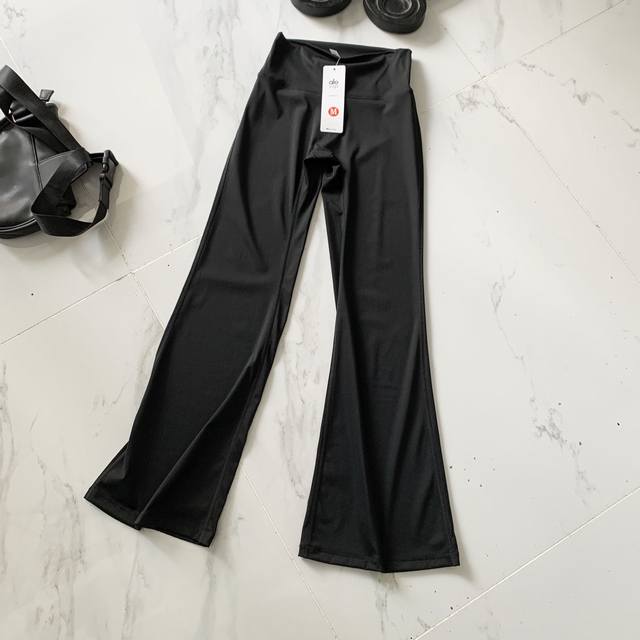 Flared yoga pants The leg label design is better than Lulu. Wearing Alo's pants