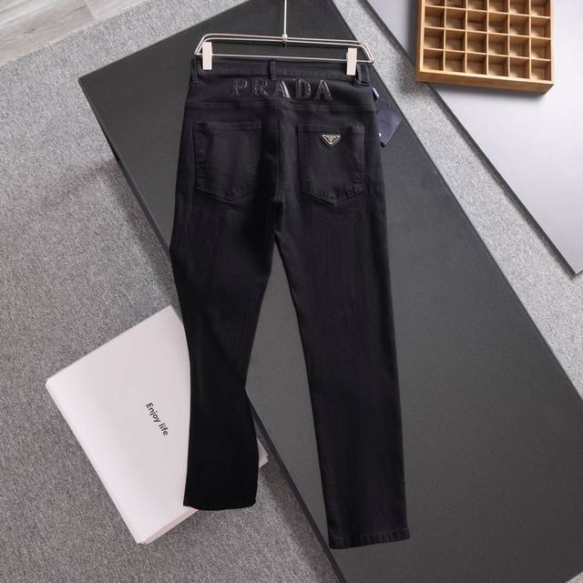 Prada Spring and Summer New Men's Jeans Logo on the waist back. Made of leather