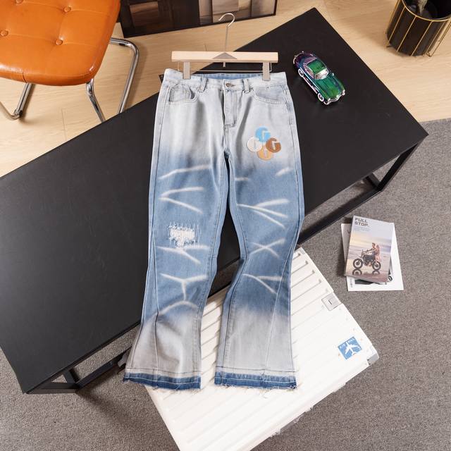 Gallery DeptDenim patchwork full print ripped flared jeans, washed and distresse