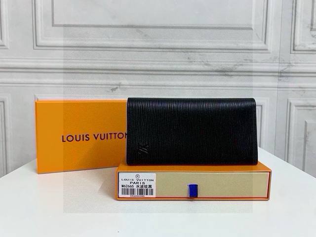 Lv Water Ripple Long Folding WalletMade of Monogram Eclipse canvasThis wallet is
