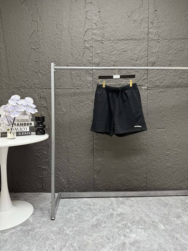 Balenciaga Balenciaga ink-splashed blurred printed logo shorts and cropped pants