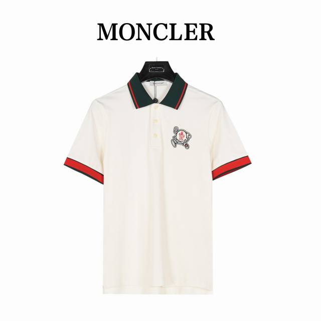 Moncler short-sleeved polo shirt with embroidered running man badge Made of 100%