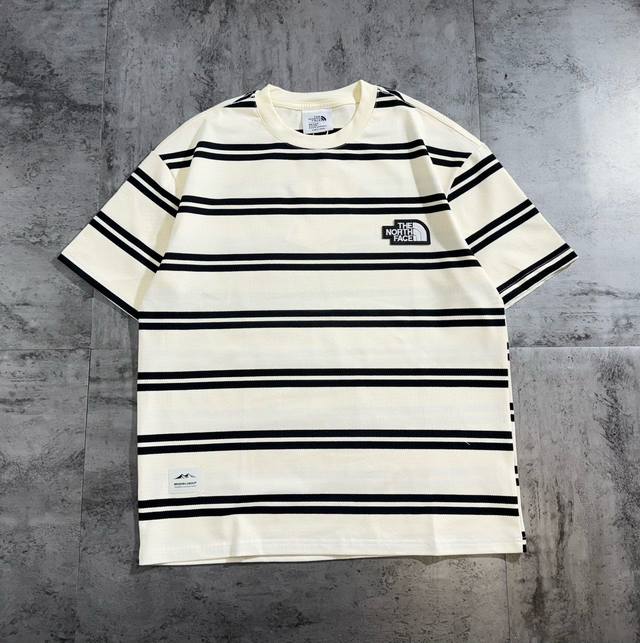 The North Face stripe print couple raglan sleeve short-sleeved T-shirt The fabr
