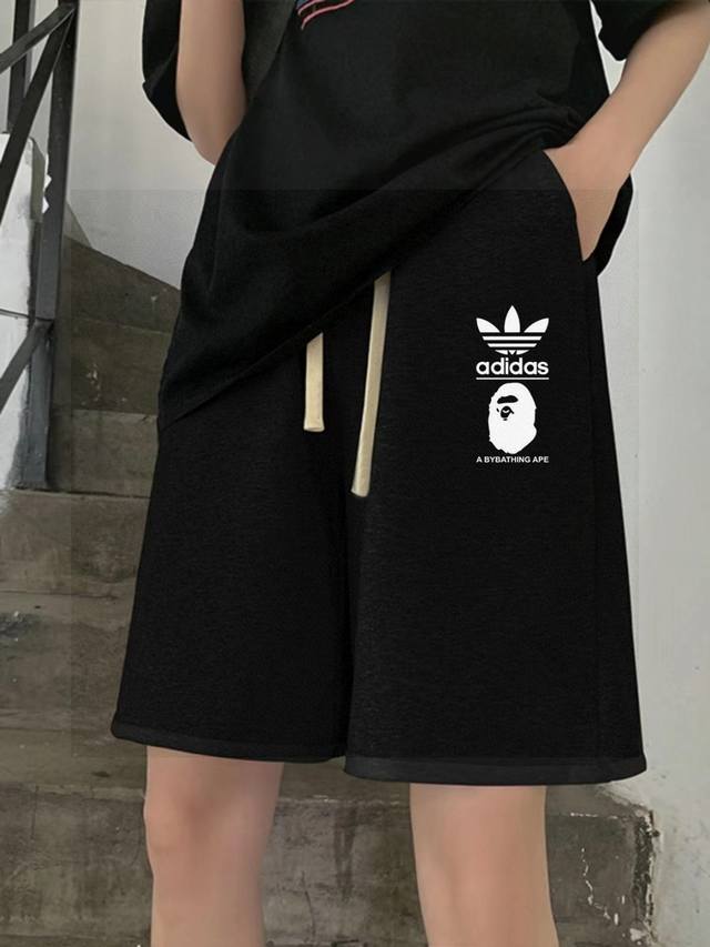 The latest joint letter print shorts for men and women by Adidas & Bape DDD. Do