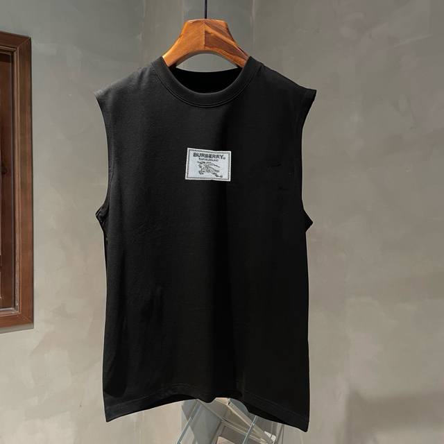 BURBERRY's new summer sleeveless vest is now online! The iconic brand embroidere