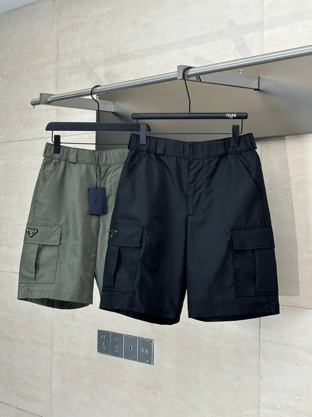 Prad* Prada double-pocket nylon work shorts are made of iconic nylon fabric. The