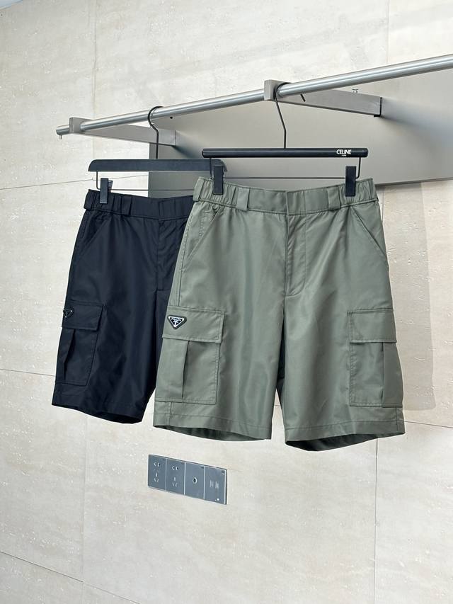 Prad* Prada double-pocket nylon work shorts are made of iconic nylon fabric. The