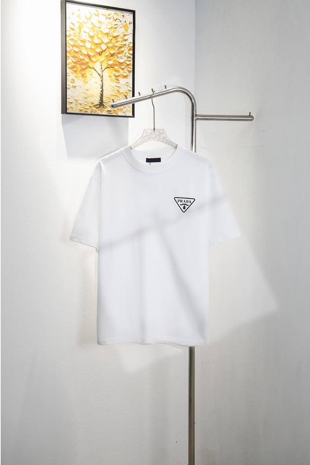 Style number: Y180 Prada classic triangle logo and small letter print short-sle