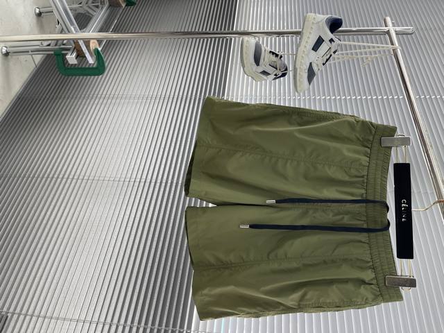 Ami Logo detail tech fabric sports shorts. Custom-woven tech polyester fabric, e