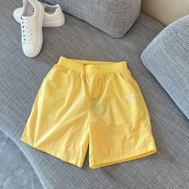 Prada 2025S new shorts, classic Prada logo below the pocket. Prada triangle iro