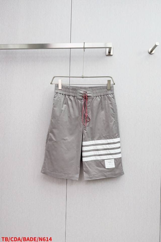N614 Tb Thom Browne laminated four-bar beach shorts Red, white and blue braided