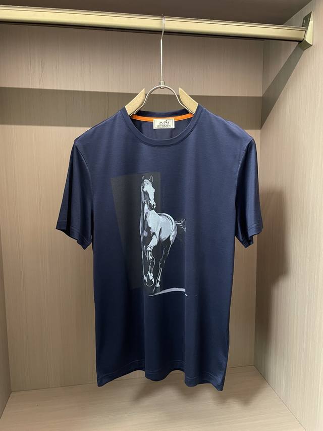 The classic round neck design of Herm