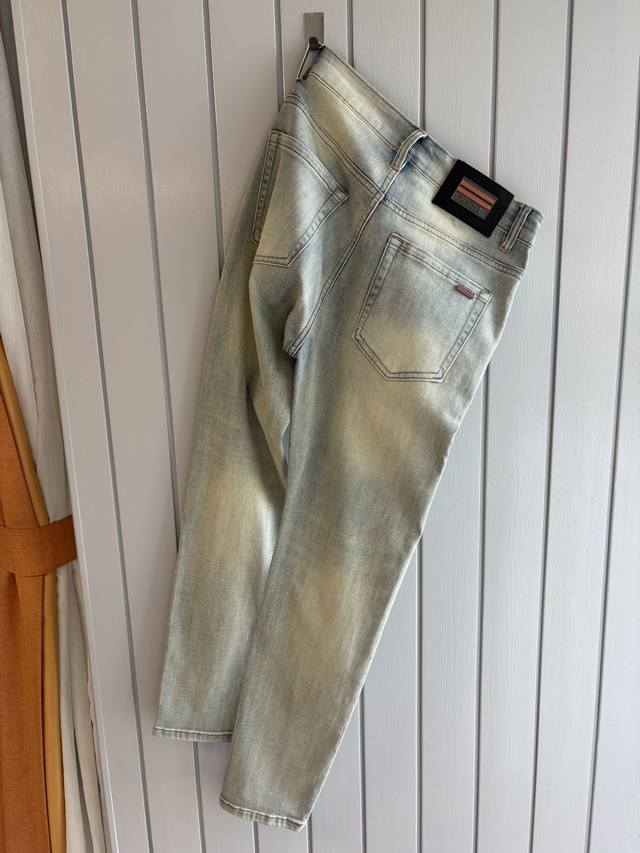 A pair of jeans with a very stylish look, custom-made original washed denim fab