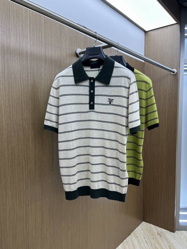 Prada Prada's new 2025 contrasting striped Polo with embroidered short logo is m