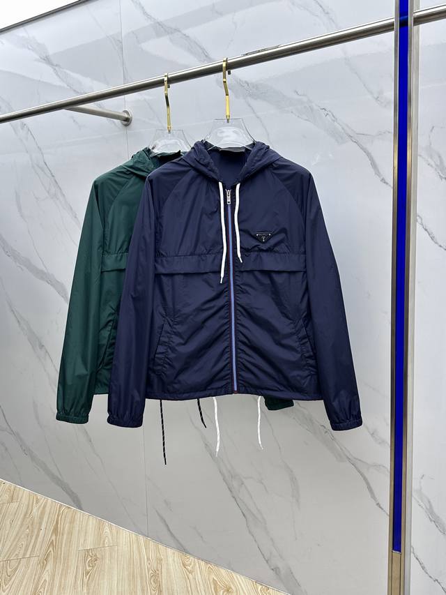 Prad*Prada 25Ss The new short jacket inspired by technical wear features a light