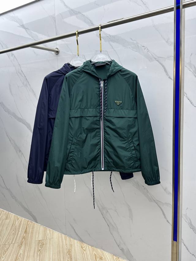 Prad*Prada 25Ss The new short jacket inspired by technical wear features a light