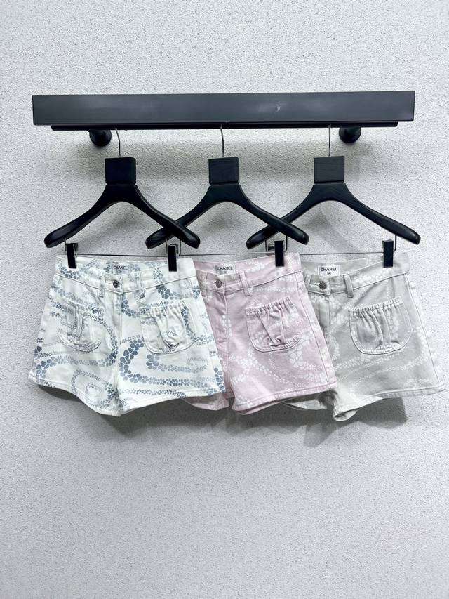 Chanel style three-color denim shorts in pink, blue and green white with a stro
