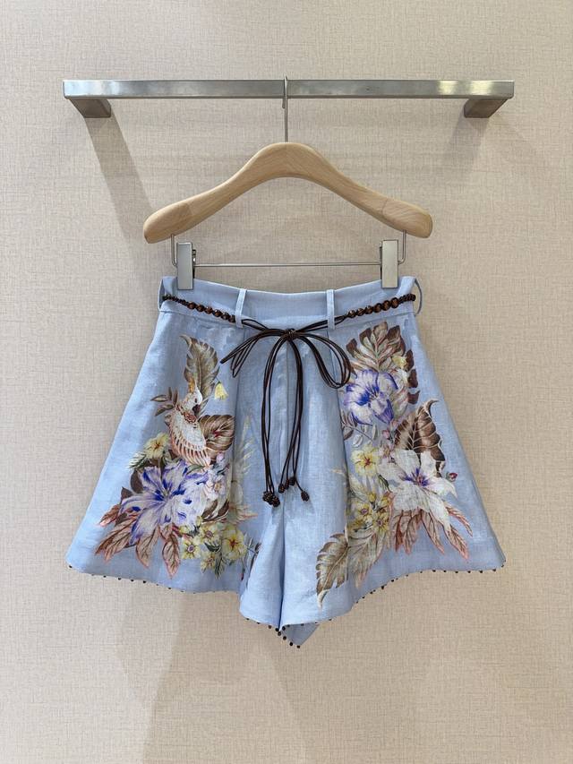 Zimmerma*N*N New Pleated Shorts This blue and colorful pleated shorts, is made o