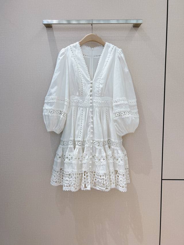 Zimmerman*N New Product Recommendation... This ivory patchwork style V-neck puff