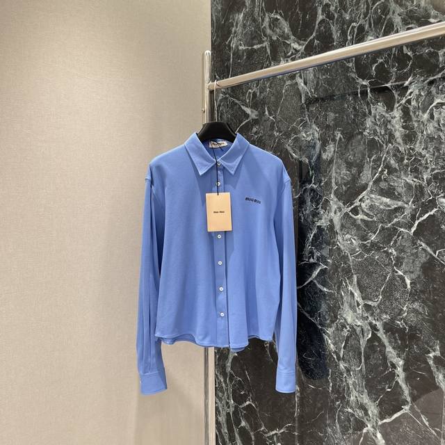 Miu 25 Early Autumn new lapel cardigan top with irregular cutting and contrastin