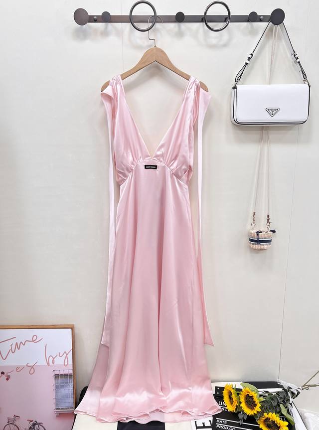 New pink satin bow suspender skirt. This soft pink satin is Miu Miu's romantic