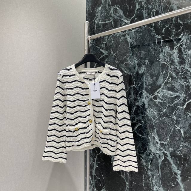 Ce 25 New early autumn striped knitted cardigan with black and white stripes. Th