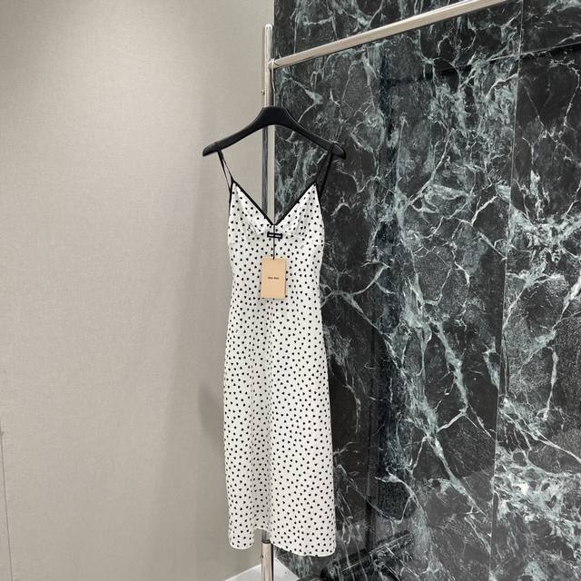 Miu 25 Early Autumn new style heart print suspender skirt with iconic logo on th