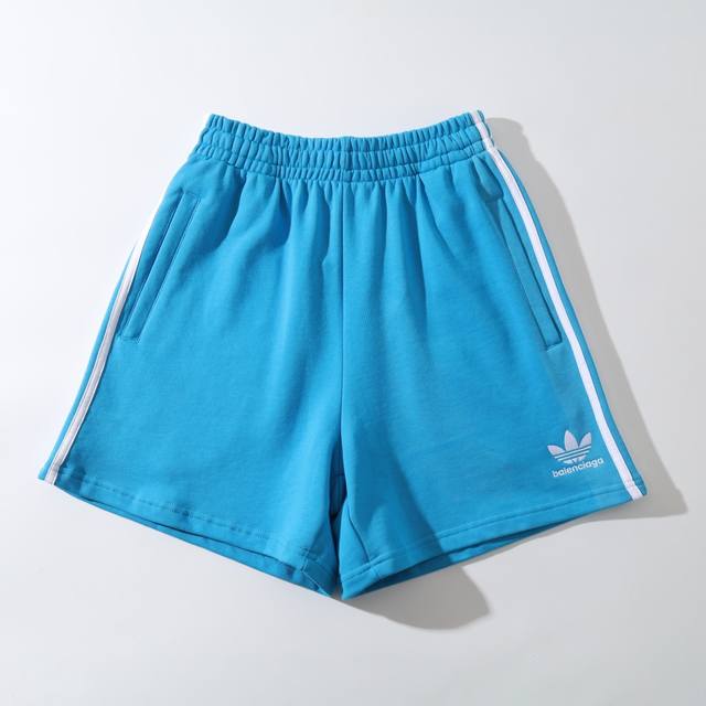 34103# Clover embroidered hem shorts shorts beach pants men and women Color: bla