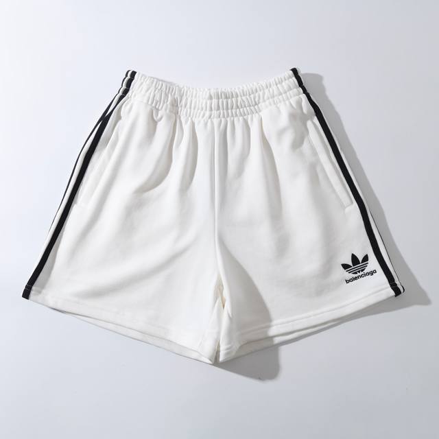 34103# Clover embroidered hem shorts shorts beach pants men and women Color: bla