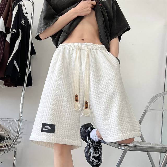 Nike 25Ss high-quality new summer two-tone work shorts with a woven label patch.