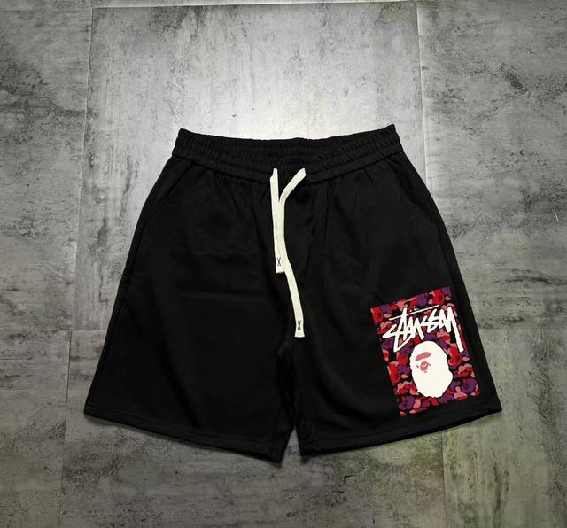 Stussy ape head versatile casual sports couple shorts. The fabric is made of spo