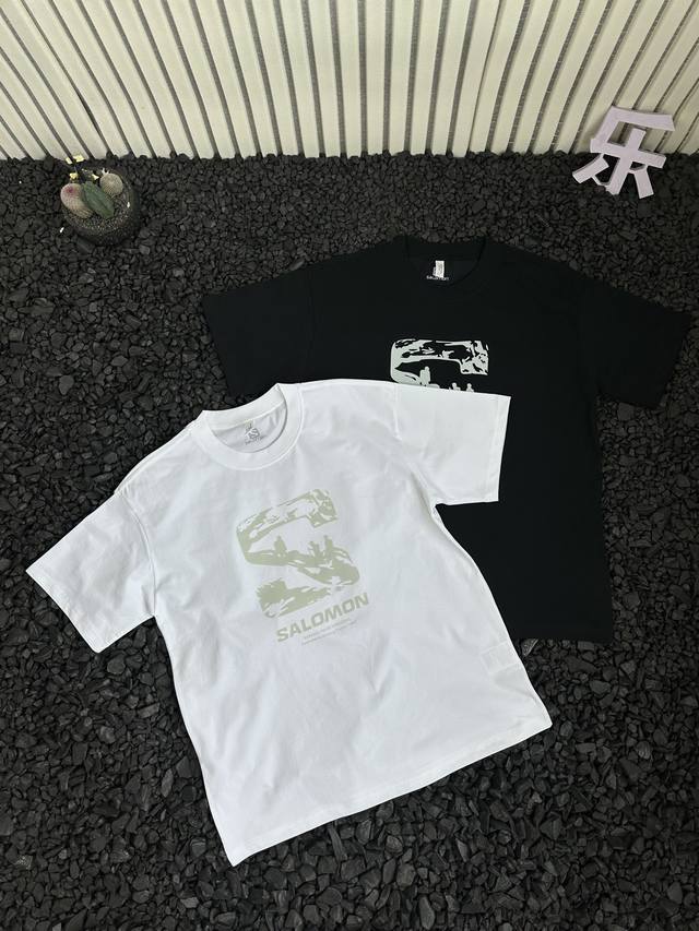 Salomon's new summer solid color commuter casual T-shirt with a large S graffiti