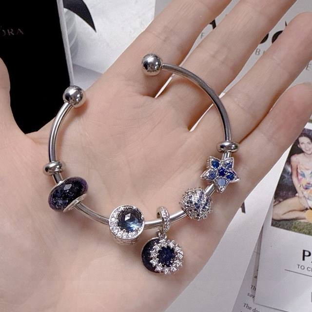 Pandora's blue five-pointed star open bracelet, each bead representing luck and