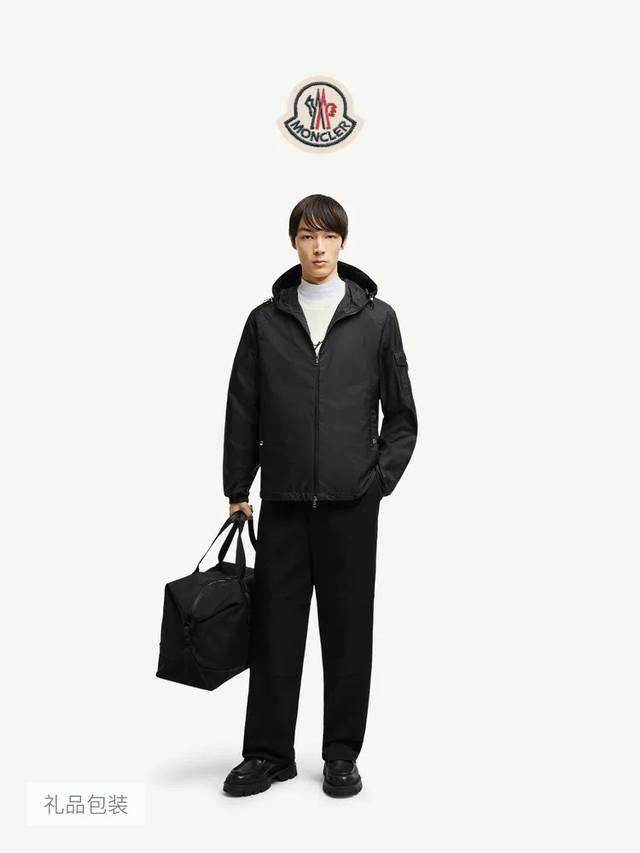 The Moncler Etiache Men's Hooded Skin Jacket offers dual protection for both the