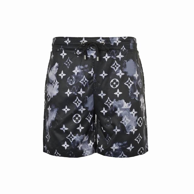 Louis Vuitton Night Sky Printed Monochrome Beach Shorts. Made of finely woven fa