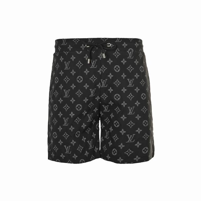 Louis Vuitton all-over monogram beach shorts. Made of finely woven fabric with c