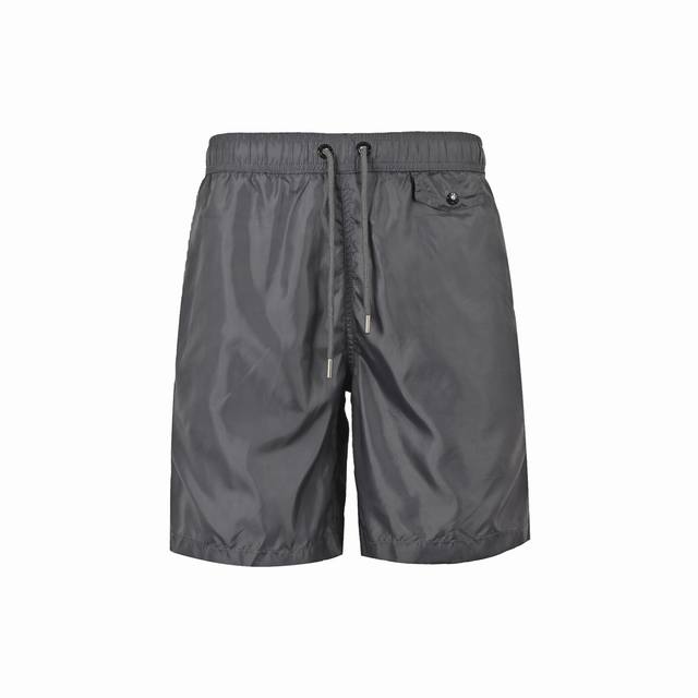 Moncler Classic Pocket Logo Woven Shorts. These shorts are made of quick-drying