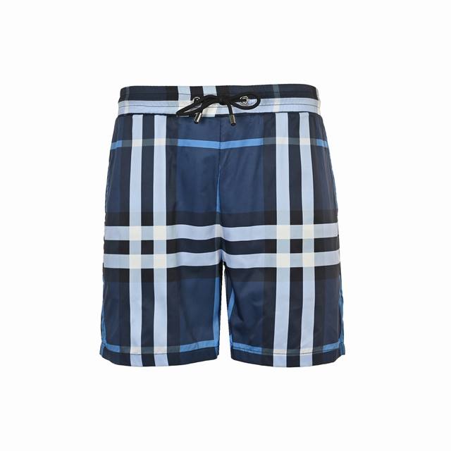 Burberry Classic Large Check Beach Shorts. These slim-fitting shorts offer a lig