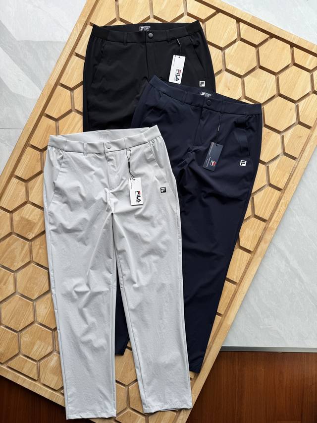 Fila Official Men's Woven Quick-Drying Running Pants. These basic, simple straig