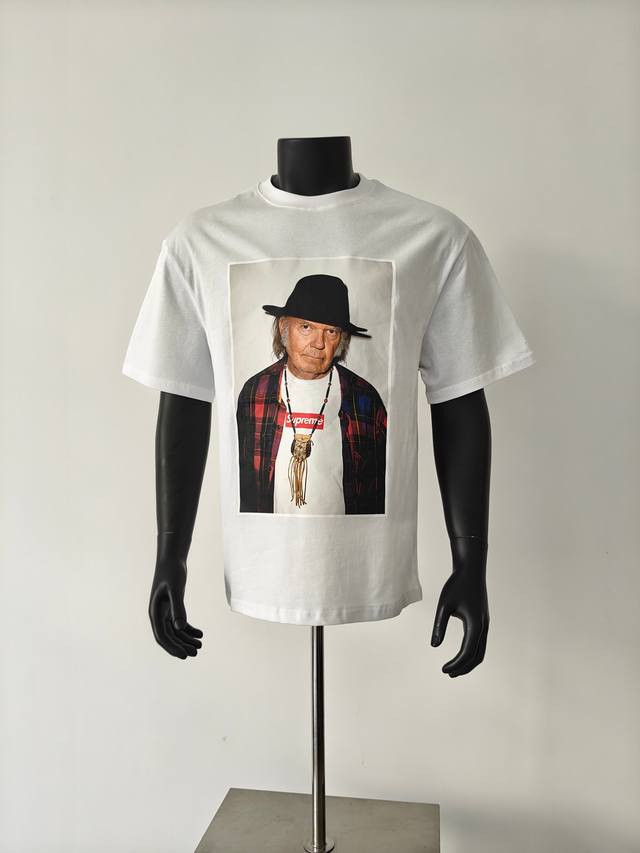 Supreme 25Ss Neil Young Tee features a co-branded photo and logo print featuring