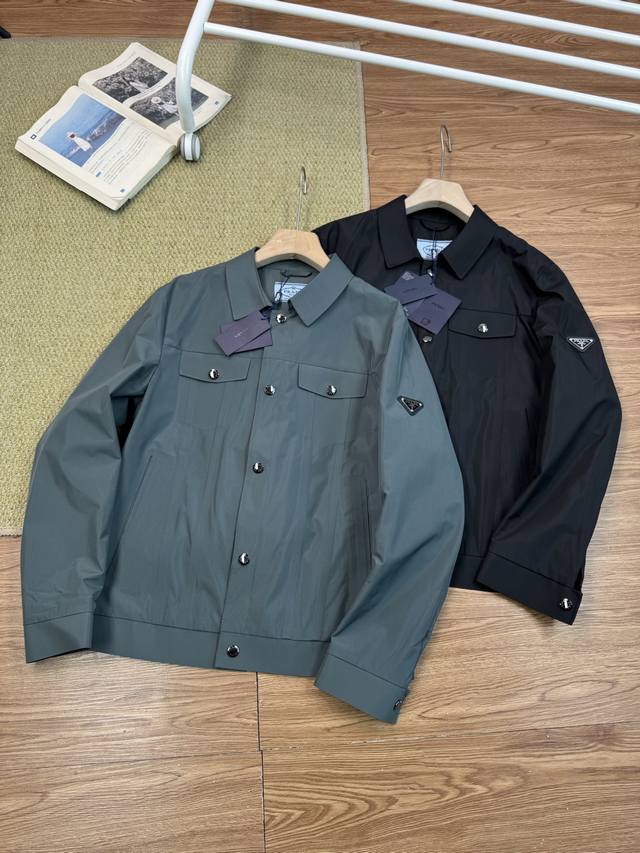 Prada's new fall stand-up collar workwear jacket, a limited edition custom-made,