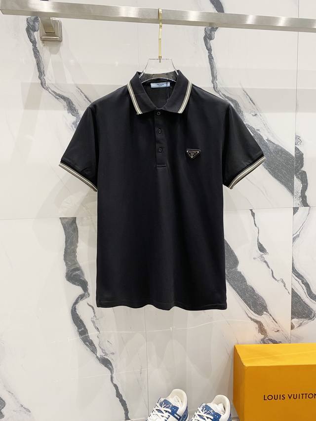 Prada lapel polo shirt with woven contrasting collar and classic triangle badge.