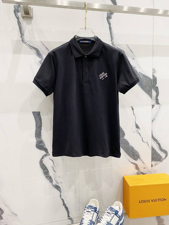 Louis Vuitton lapel polo shirt with small embroidered logo and pin. Official bus