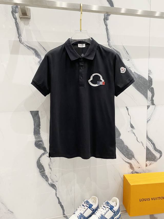 Moncler lapel polo shirt with brand logo and letter embroidery. Logo badge on th