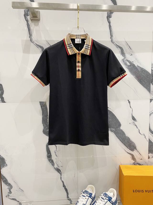 Burberry lapel polo shirt with brand plaid woven collar and logo patchwork. Offi