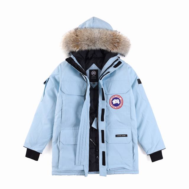 Canada Goose Expedition '08 Parka in azure blue with a white background. Exclusi