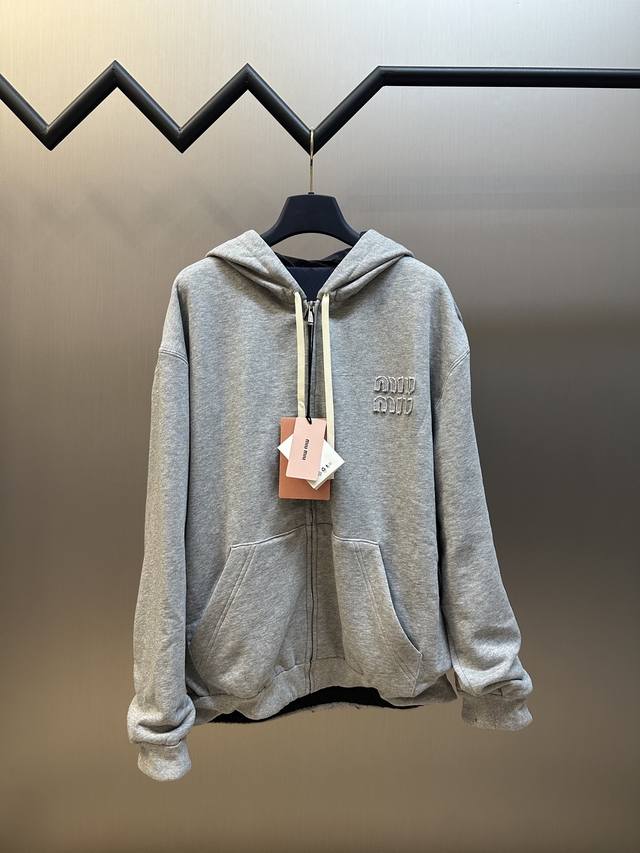 Miumiu Reversible Sweatshirt Jacket. This knit and technical Pong
